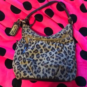 Cheetah print Tignanello purse.