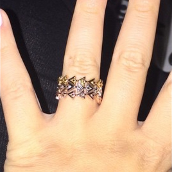 Louis Vuitton V stackable rings.