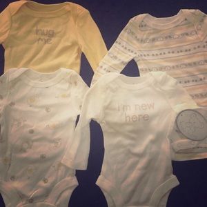 NWT Bundle of four long sleeved Newborn Onesies