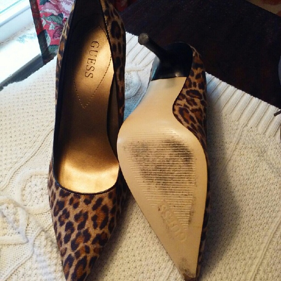 Size 7 GUESS high heel shoes