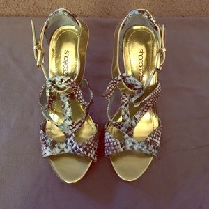 Snake print heels with buckle