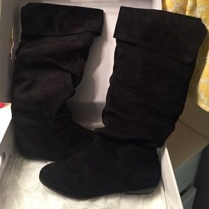 Tall black velvet boots
