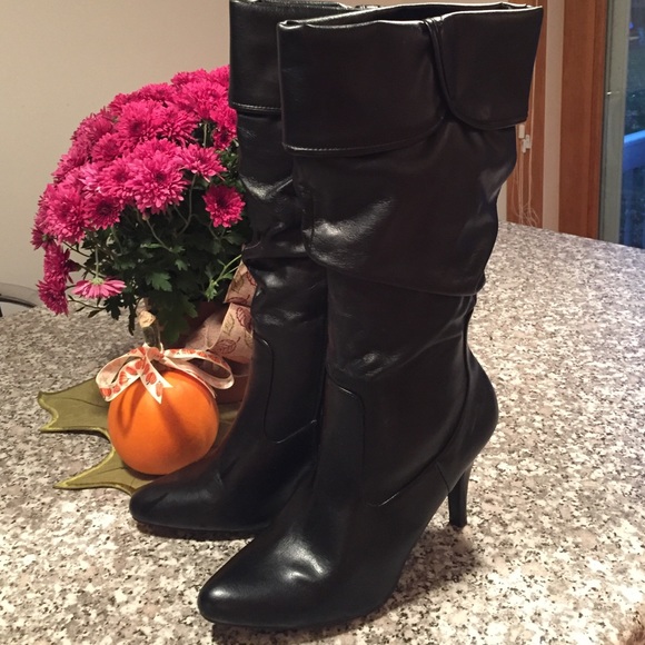 Black leather heeled slouch boots