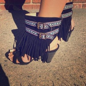 Black fringe shoes