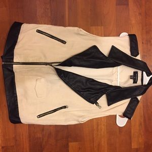 Edgy, chic short sleeve vest