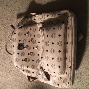 Peach colored MCM bag