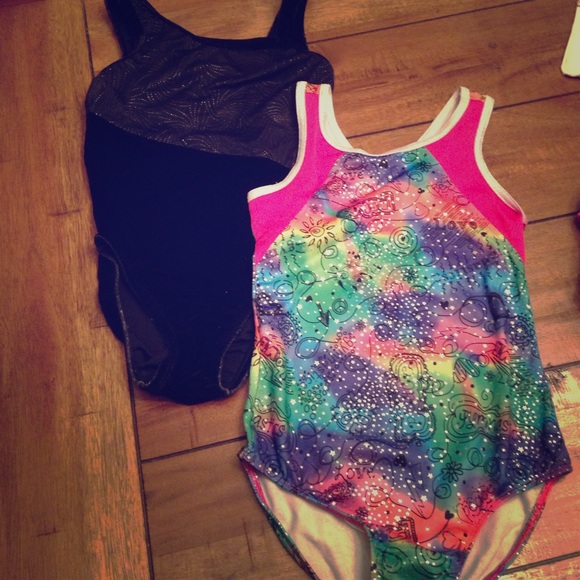 2 gymnastic leotards fit size 7-8 kids