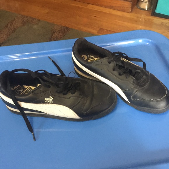 Black and white leather Puma