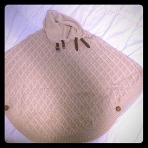 Knitted beige color turtle neck throw over cover.