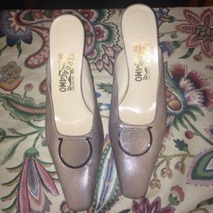 Snake skin Pointed toe ferragamo heels.