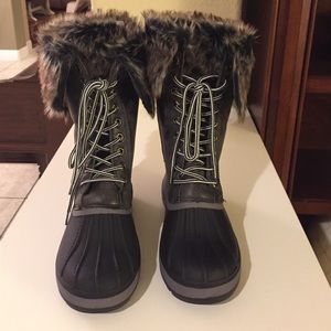 Brand new, NWT faux fur rain boots.