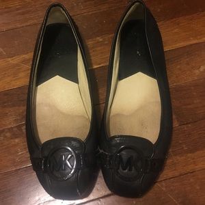 MIchael Kors flat with wear and tear