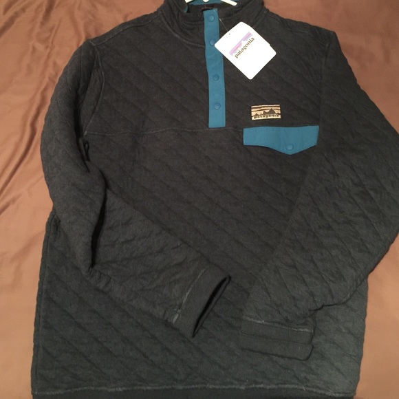 Blue Patagonia fleece. Never worn tags still on