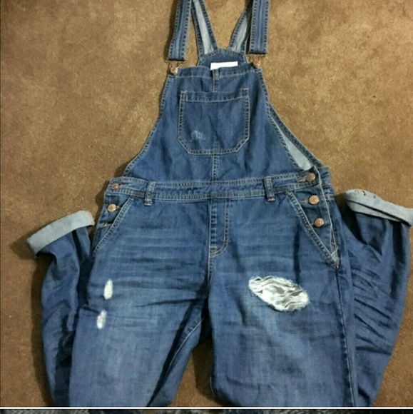 Skinny distressed overalls