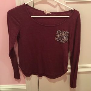 maroon long sleeved shirt