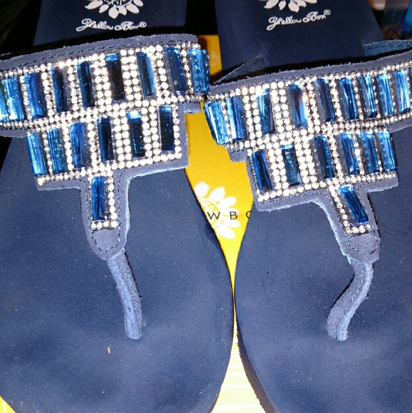 Yellow box flip flops
