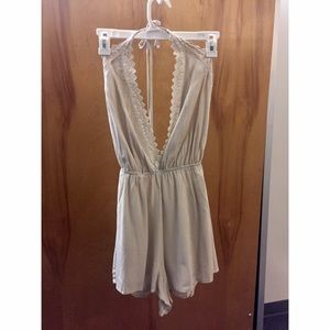 Nude colored, open back, romper