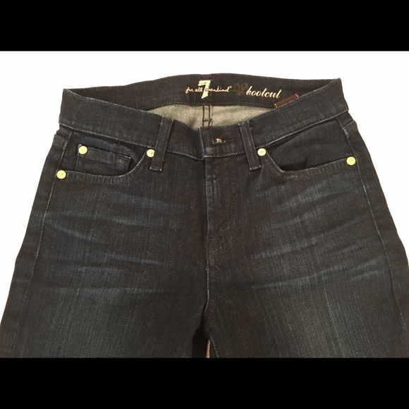 Never worn 7 for all MK Boot Cut Navy Jeans