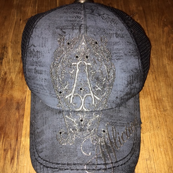 Affliction snap back
