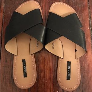 Black, criss-cross open-back sandals