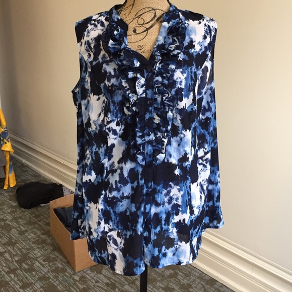 Sleeveless button down top with ruffled accent