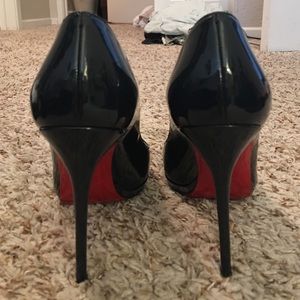 Closer look at the christian louboutin shoes.