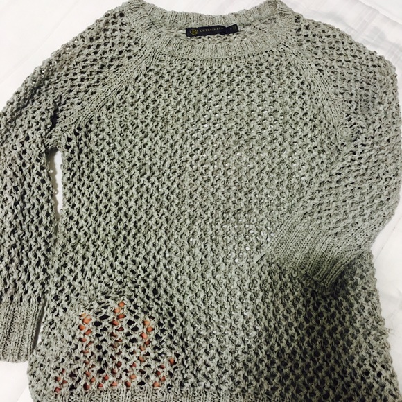Wide knitted sweater