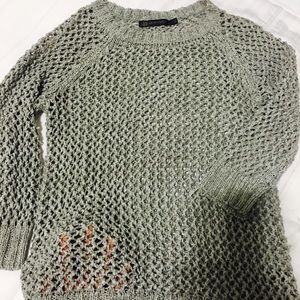 Wide knitted sweater