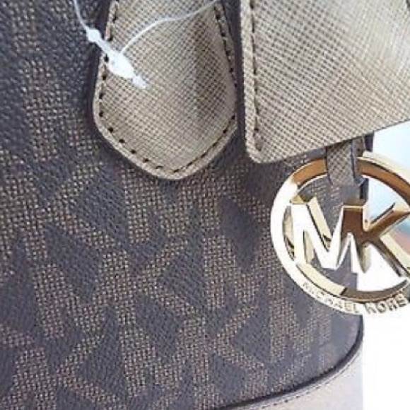 Authentic large dome Michael Kors crossbody.
