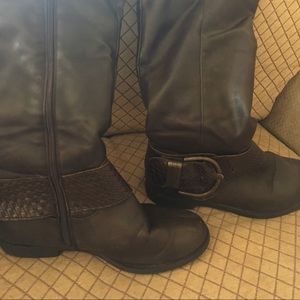 Brown boots with buckle detail