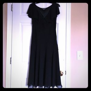 Chiffon black beaded dinner dress.