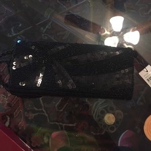 Small black hand bag.