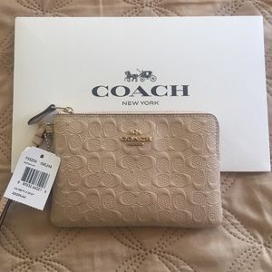 A beautiful brand new Coach wristlet