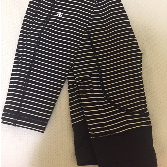 Lululemon black/white speed tight.  Sz 4. $120 OBO