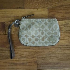 Authentic Coach wristlet.