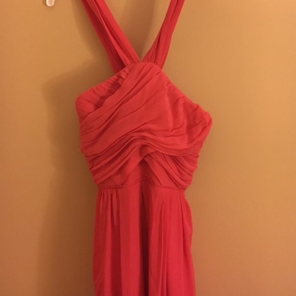 Halter neck pink flowy dress.