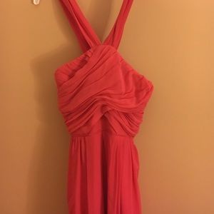 Halter neck pink flowy dress.