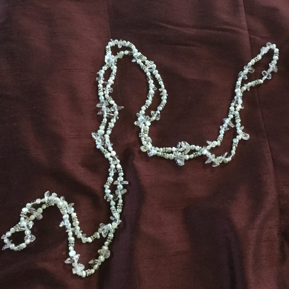 Crystal, pearl and silver necklaces.