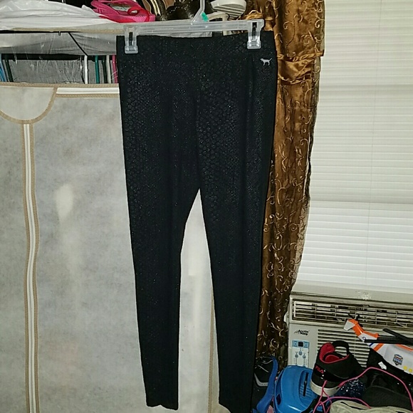 Woman's pink cropped skinny legged pants.