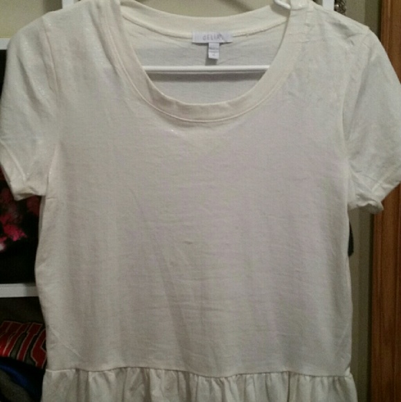 Delias cream ruffle bottom peplum size medium