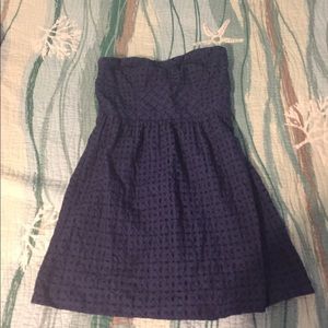 A mini strapless dress