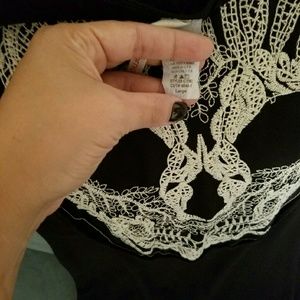 Black dress with skull on the back