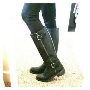 Tall black riding boots