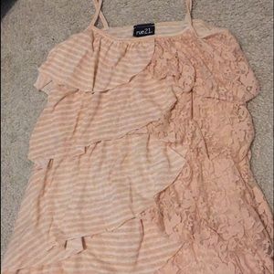 Light pink and white tank top.