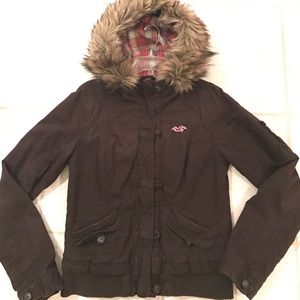 Dark brown utility jacket with fur lined hood