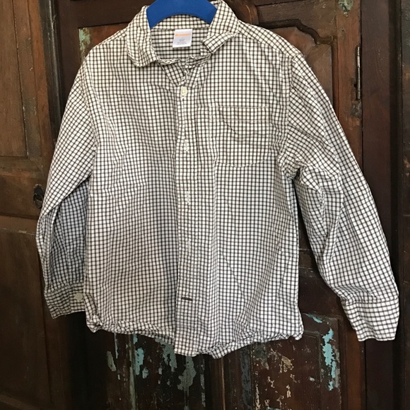 Brown &a white check shirt.