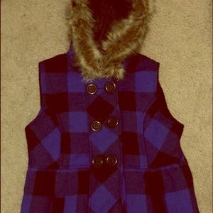 Blue and black plaid vest.