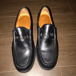 Black leather Gucci loafers
