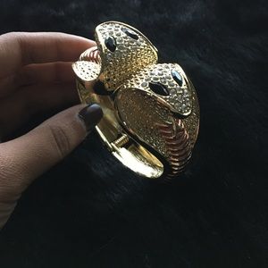 Gold jeweled snake cuff