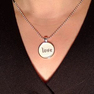 Four letter word pendant necklace